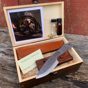 A knife and some wood in a box