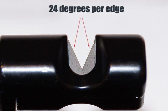 A black plastic tube with the word " edge " written on it.