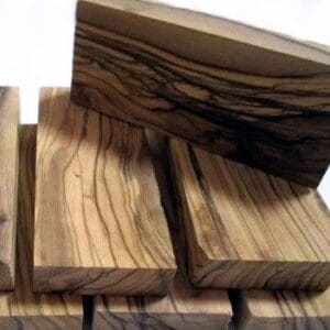 A stack of wood that is stacked on top of each other.