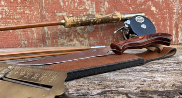 A wooden table with some tools on it